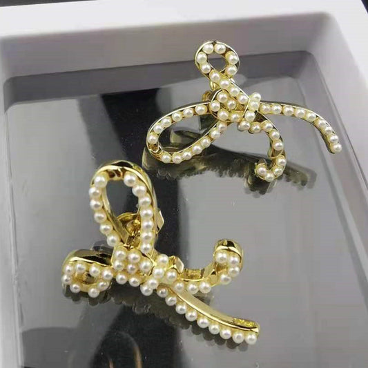 赛家新款耳钉女珍珠蝴蝶结精致INS风法式耳饰不规则蝴蝶结耳钉