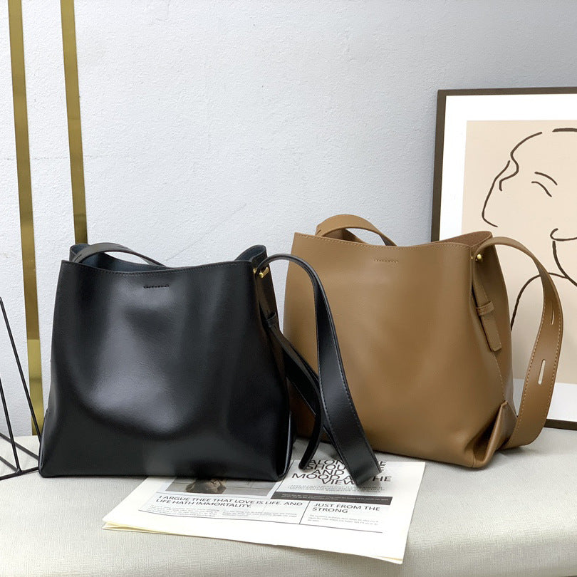 真皮水桶包女2023新款小众设计通勤女包单肩斜跨包时尚百搭托特包