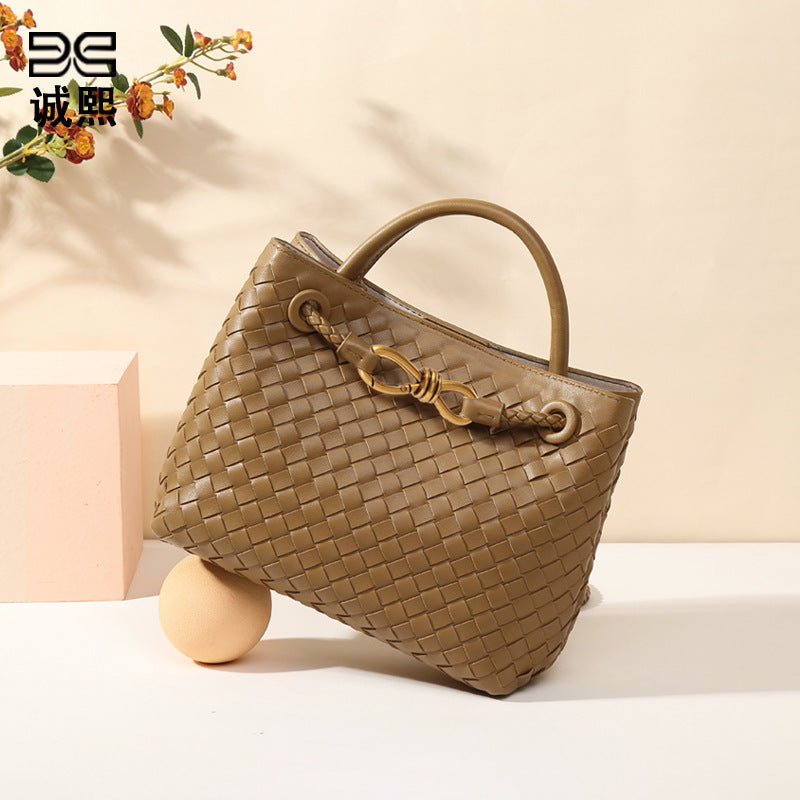 时尚小众手提女包蝴蝶结金属手工编织包质感休闲大容量单肩斜挎包