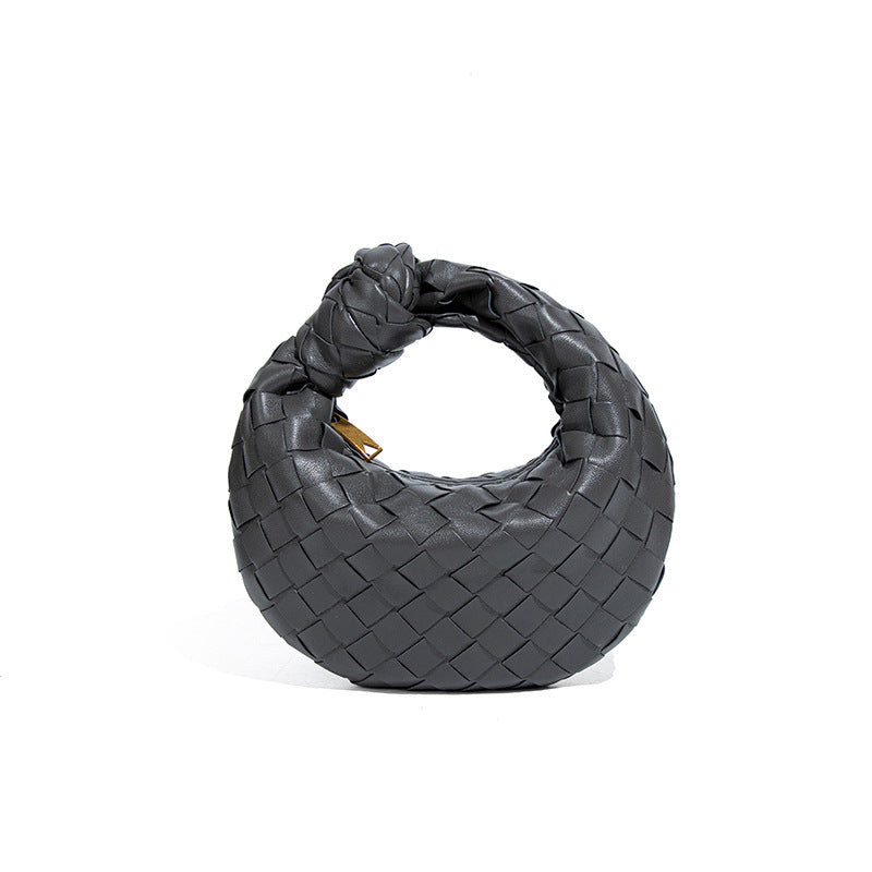 外贸新品时尚手拎饺子包打结手工编织女包百搭mini质感纯色牛角包