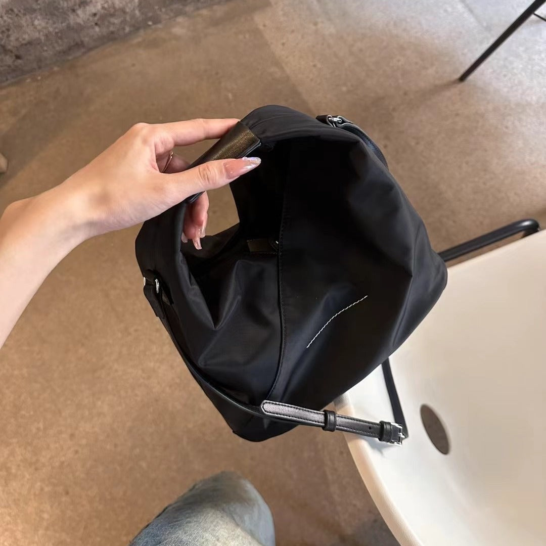 防水牛津布帆布水桶包女高级感小众手提饭盒包真皮斜挎包小托特包