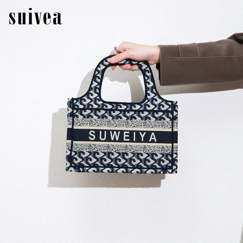 包包2025秋冬新款时尚欧美刺绣棉麻购物袋迷你手提包单肩斜挎女包