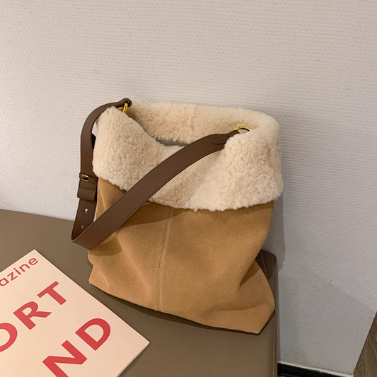 真羊羔毛水桶包包2023新款轻奢女包斜挎单肩腋下手提大容量真皮包