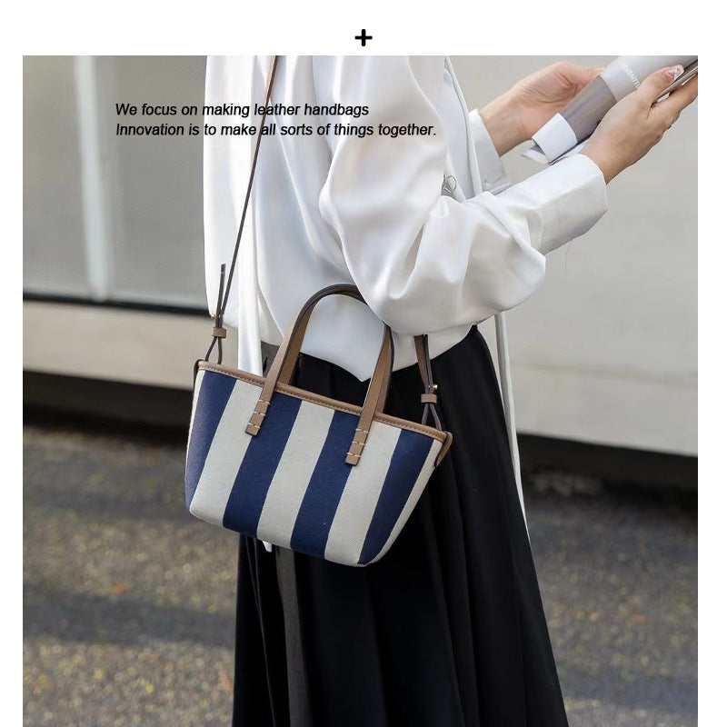 大牌包包女2024新款百搭大容量托特包条纹帆布通勤单肩手提购物袋