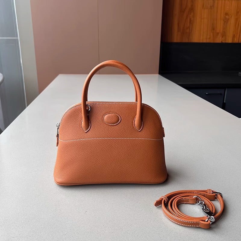 新款荔枝纹真皮贝壳包头层牛皮保龄球手提包拉链大容量通勤女包