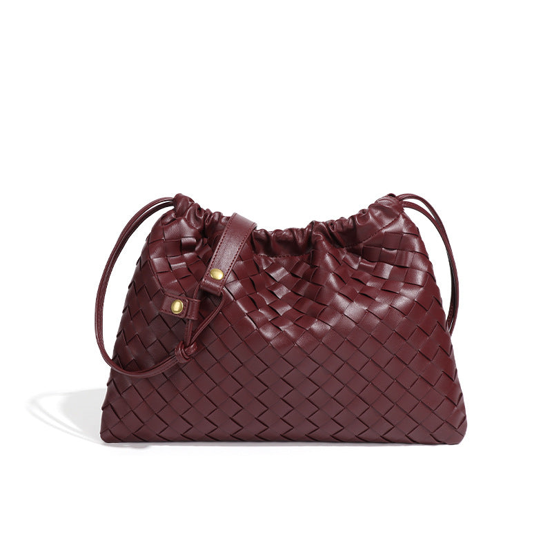 跨境爆款磨砂编织女包2025新款束口云朵包时尚小众单肩斜挎饺子包