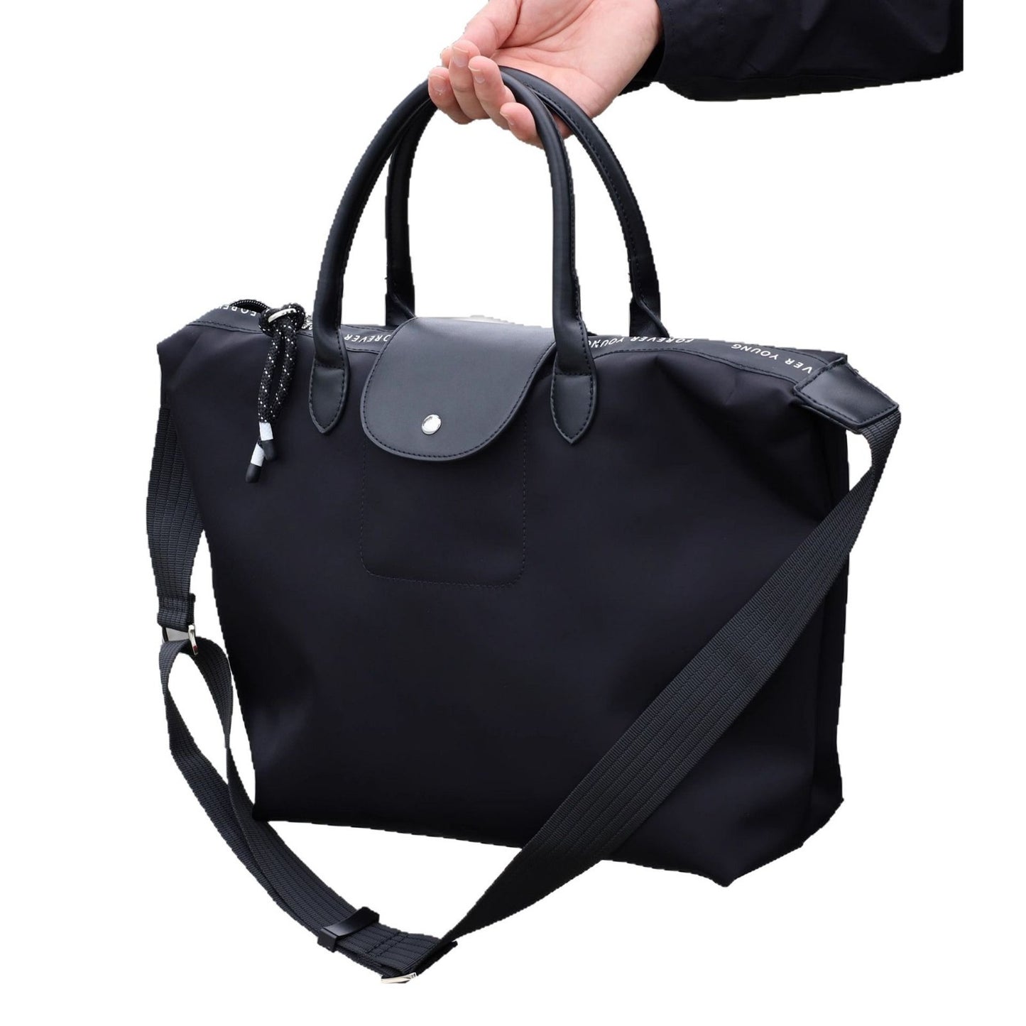 高级感斜挎饺子包黑色男女同款手提托特包百搭通勤休闲包无痕代发