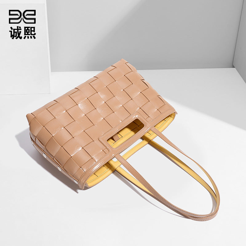 加工定制包包大容量时尚简约纯色镂空手工编织镂空单肩通勤托特包