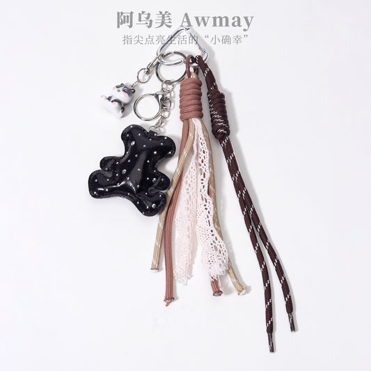 量大价优PU皮革充棉钻皮小熊树脂小猫咪织带包包挂件挂饰钥匙扣