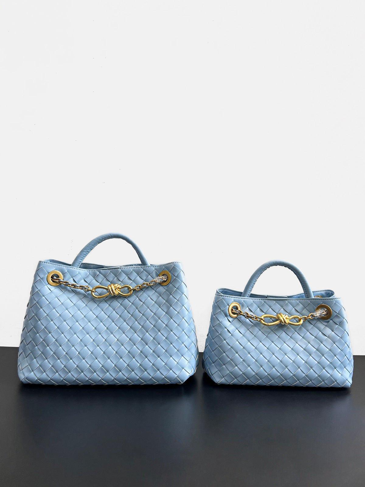 2024夏季新款编织蝴蝶结大容量真皮双肩女包单肩斜跨手提包