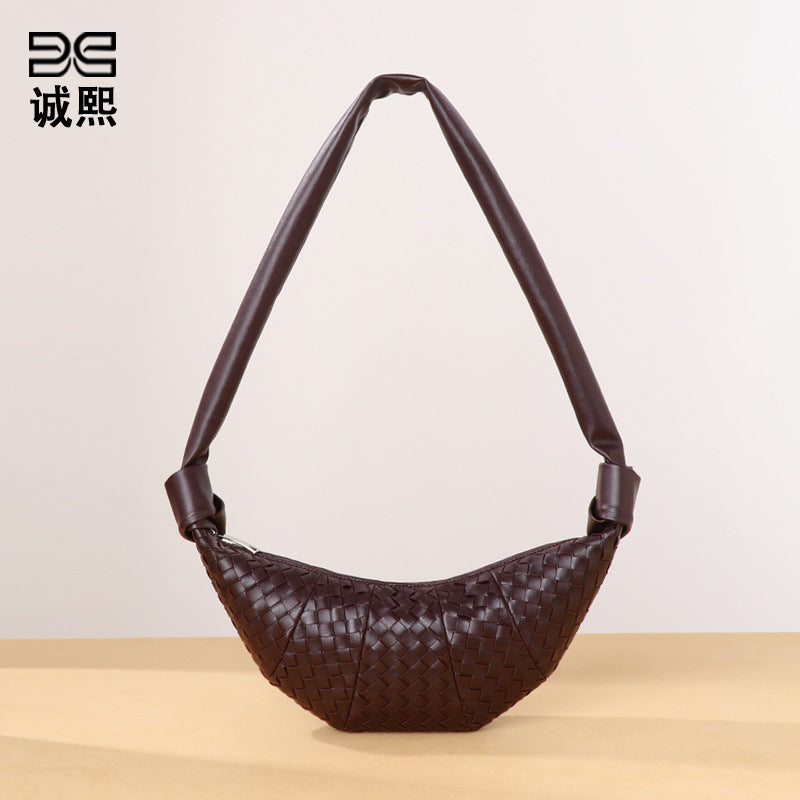 韩版慵懒风牛角包潮流单肩斜挎饺子包小众编织女包新款时尚可颂包