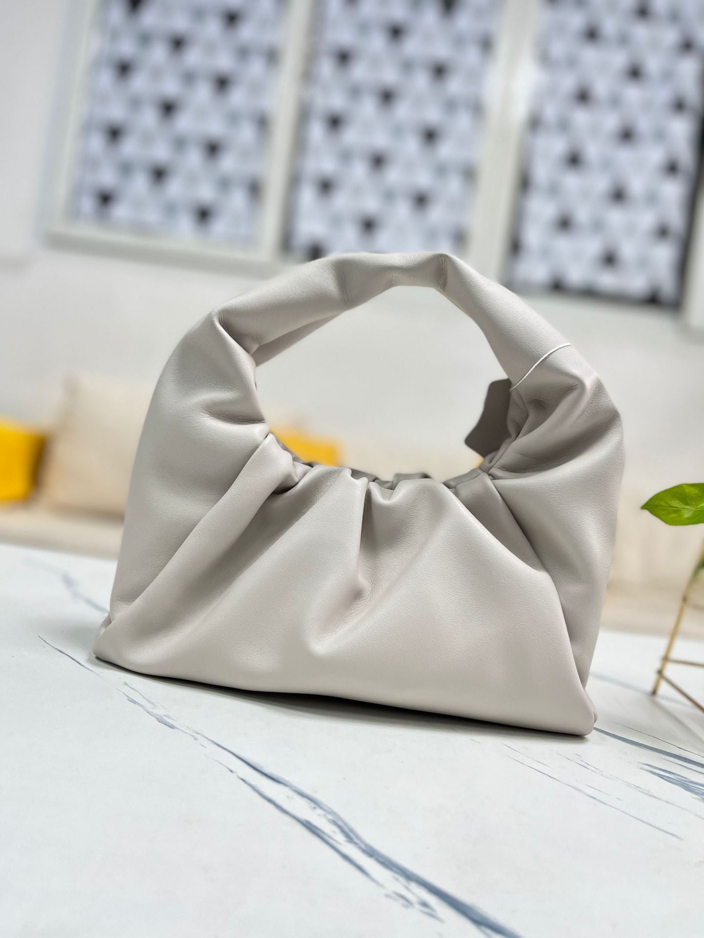 包包女2022新款女包牛角包pouch云朵包饺子包手提单肩包真皮女包