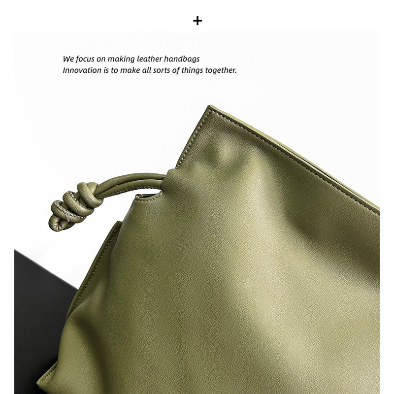 真皮单肩斜挎抽绳褶皱法式高级感牛皮大容量通勤包女软皮云朵包包
