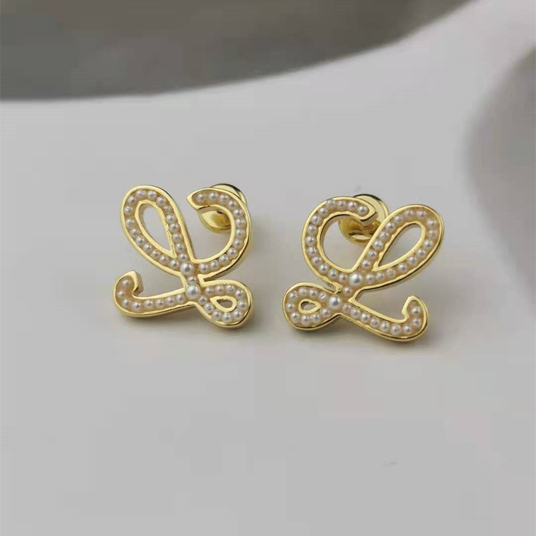 罗家新款几何抽象珍珠耳钉高级感时尚气质厂家批发高版小米珠耳环