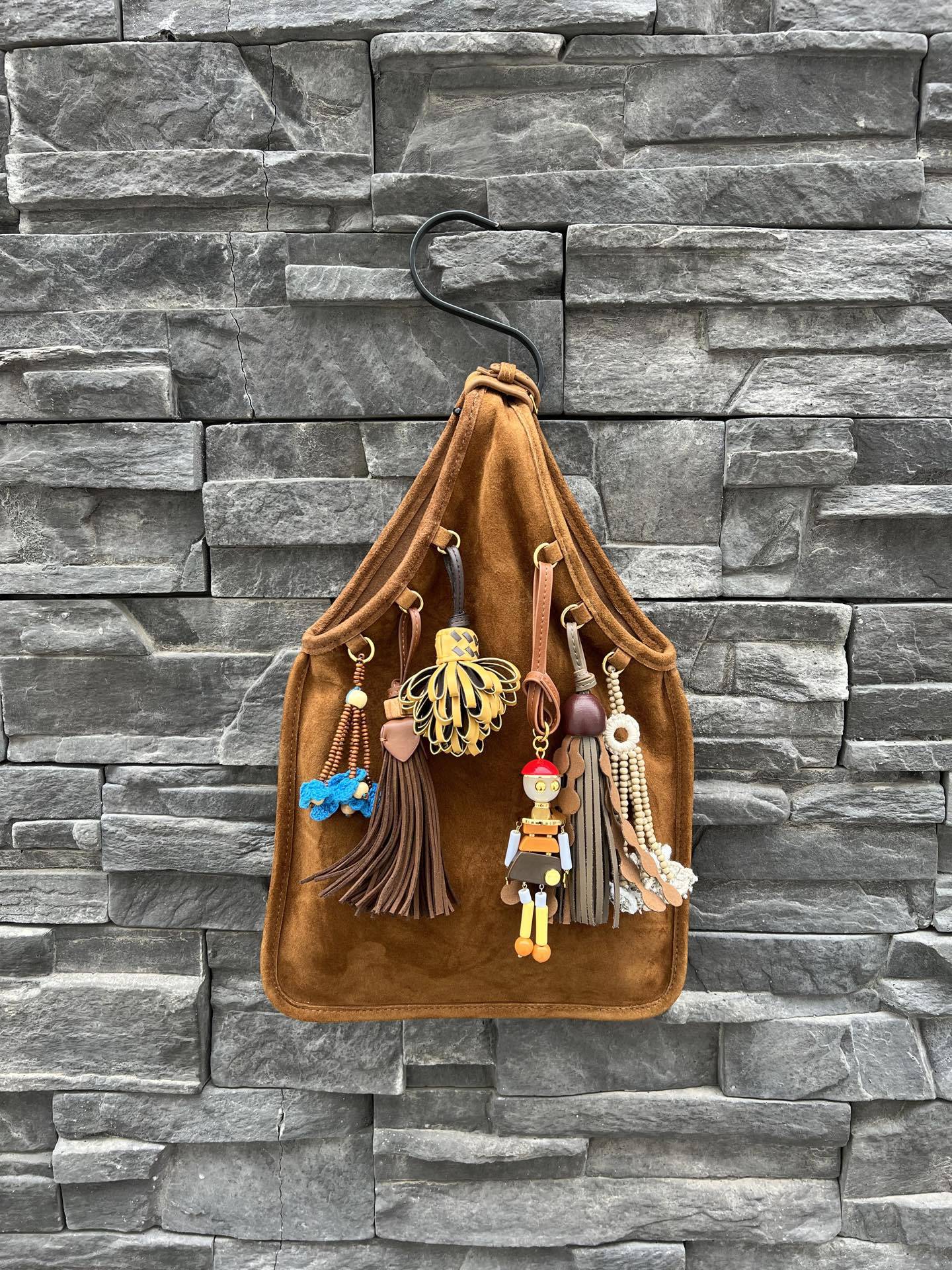 包包女2025新品网红撞色牛皮小众设计流苏手拎包简约时尚手提包潮