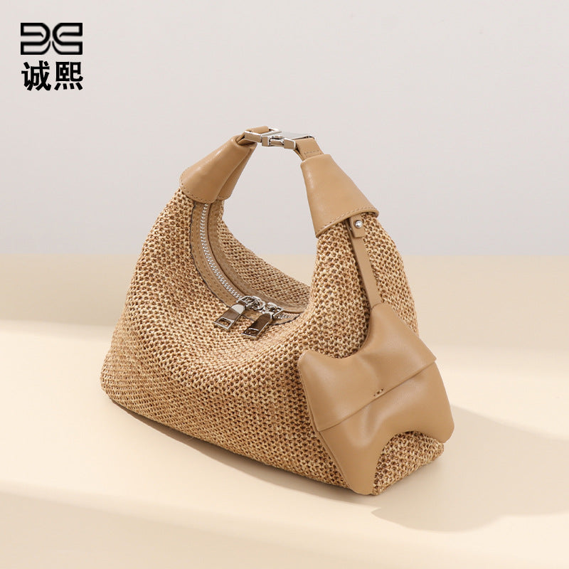 海边夏日新款拉菲草手拎饭盒包休闲百搭单肩腋下包时尚草编饺子包