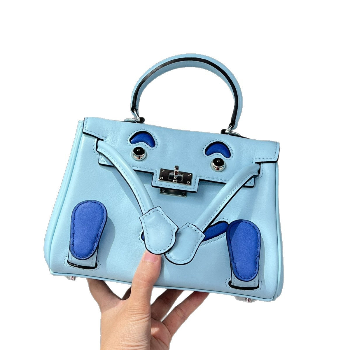 2025春季高级感头层牛皮笑脸包 千禧娃娃迷你凯莉包可爱斜挎包