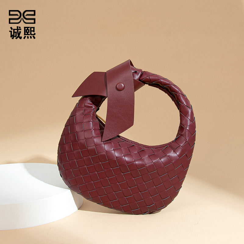 2025跨境新款手工编织牛角包时尚百搭手提女包质感休闲复古饺子包