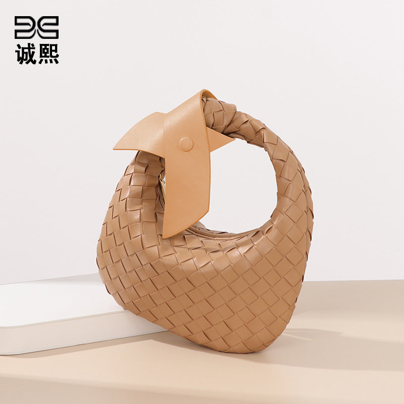 跨境潮流编织女包高级感手提百搭简约饺子包夏季休闲蝴蝶结牛角包