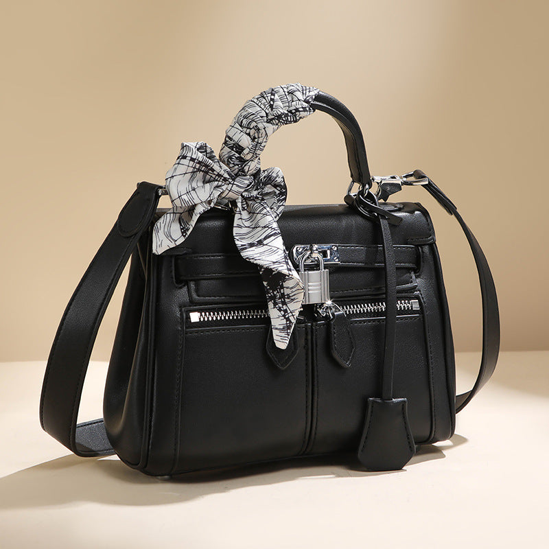 百搭通勤单肩斜挎包宽肩带凯莉包手提包真皮大容量单肩斜挎包女