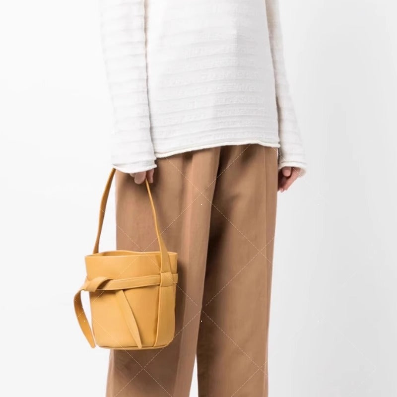 大牌女包蝴蝶结水桶包抽绳手提包打结束口简约通勤大容量托特包