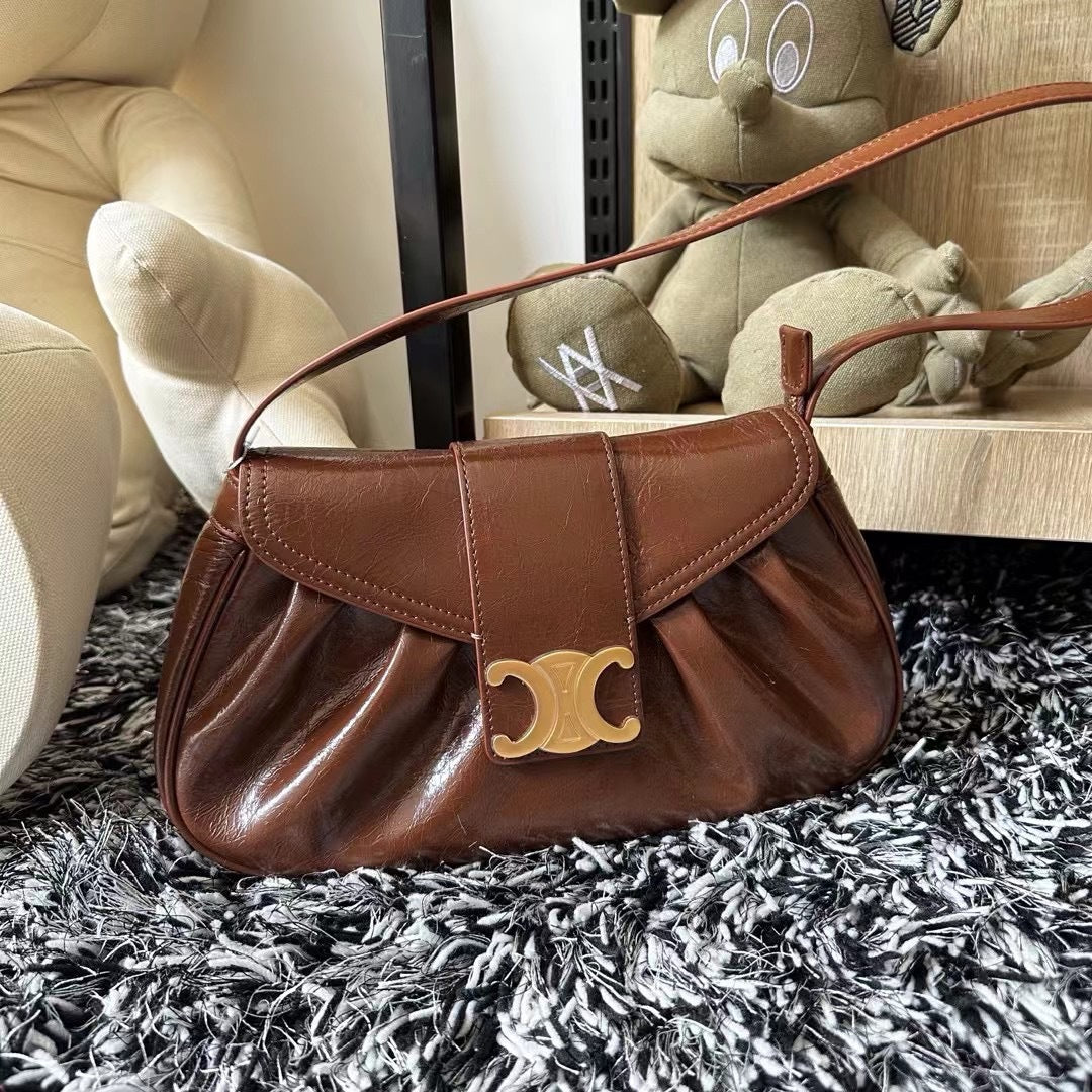 头层牛皮凯旋门真皮褶皱云朵包腋下包法棍包时尚百搭单肩手提包女