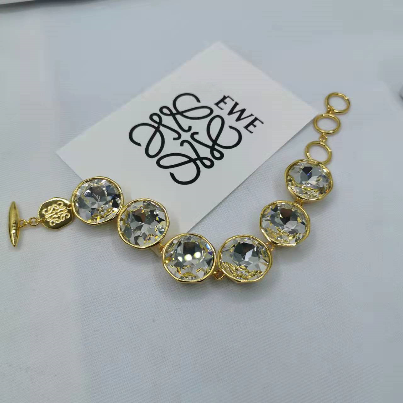 罗家21新款镶钻水晶耳钉女手链项链高级感气质闪钻几何形半圆耳环