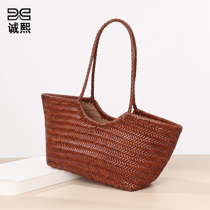 春夏手提女包牛皮单肩腋下托特包真皮小众编织包大容量菜篮子母包