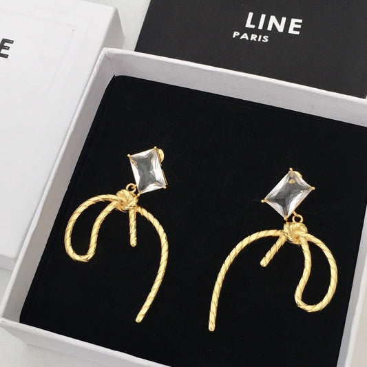 赛家22新款几何形蝴蝶丝带耳钉女高级感气质铜镀金镶钻耳环
