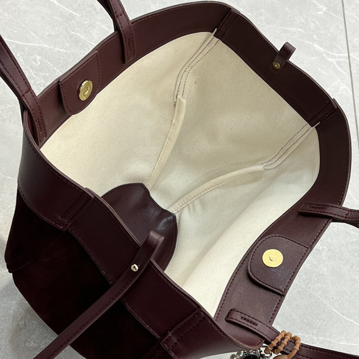 磨砂真皮菜篮子包水桶包包女高级感小众手提包麂皮绒斜挎包锦囊包