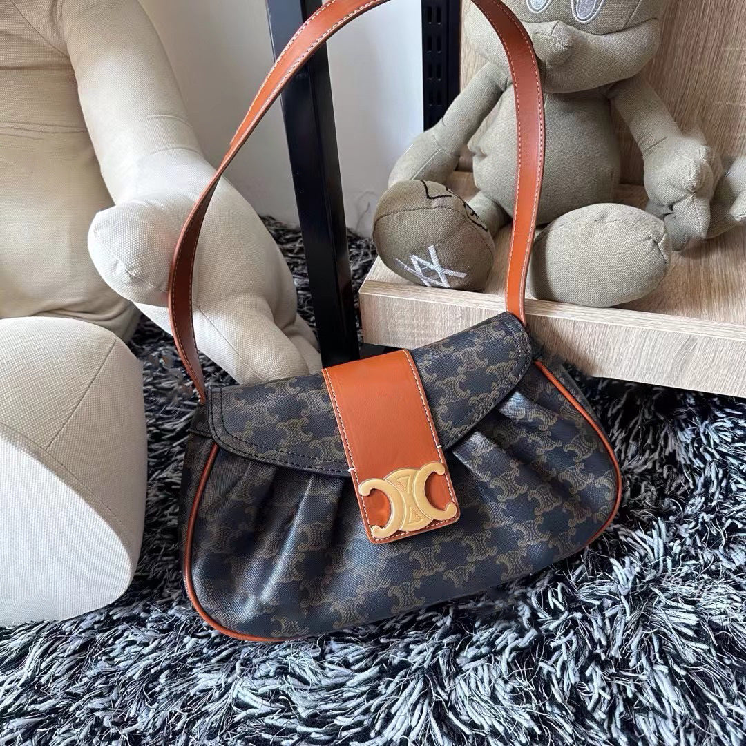 头层牛皮凯旋门真皮褶皱云朵包腋下包法棍包时尚百搭单肩手提包女