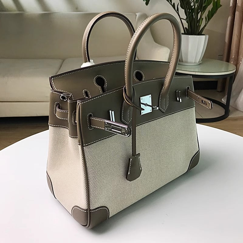 高品质时尚简约铂金包帆布拼接swift牛皮女包休闲桶包手提单肩包