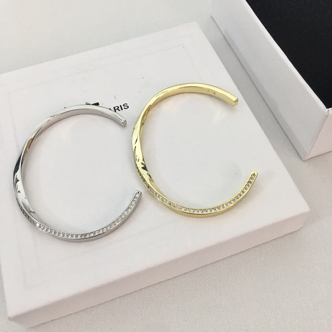 厂家批发赛家新款几何扭曲镶钻手镯高级感气质不规则扭扭开口手环