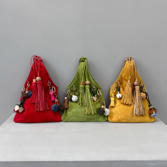 繆家2025新款麂皮流苏腋下包翻毛真皮复古手提包女玩偶挂件手拎包