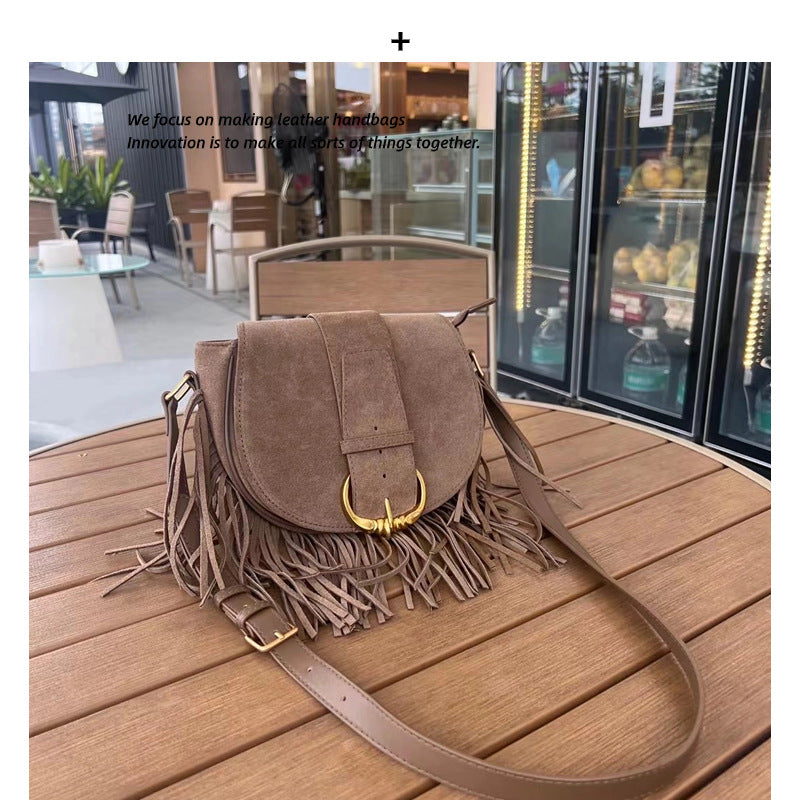 磨砂牛皮猪鼻子流苏包包时尚百搭秋冬麂皮绒女包单肩斜挎马鞍包