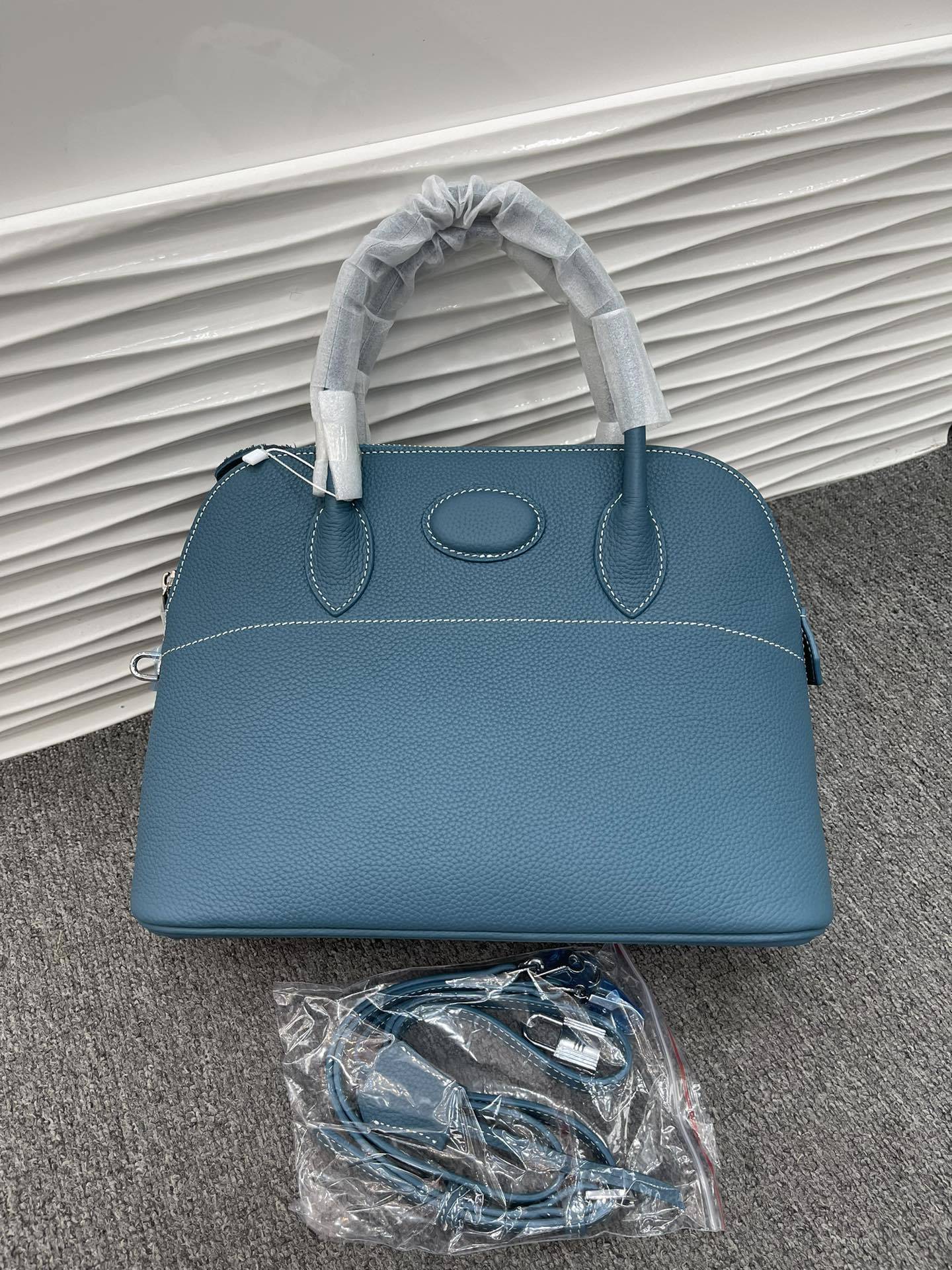 新款荔枝纹真皮贝壳包头层牛皮保龄球手提包拉链大容量通勤女包