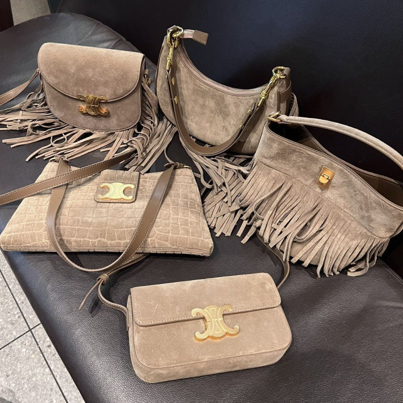 小众设计凯旋门流苏马鞍包2023新款美拉德复古麂皮绒链条斜跨小包