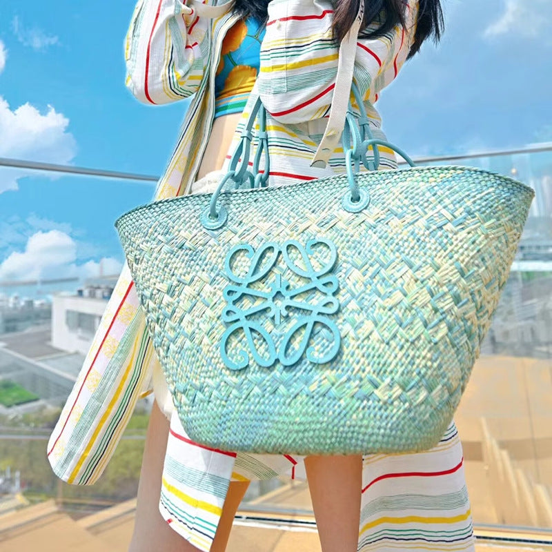 田园风手工编织托特包2024新款沙滩度假手提单肩包法式藤编草编包