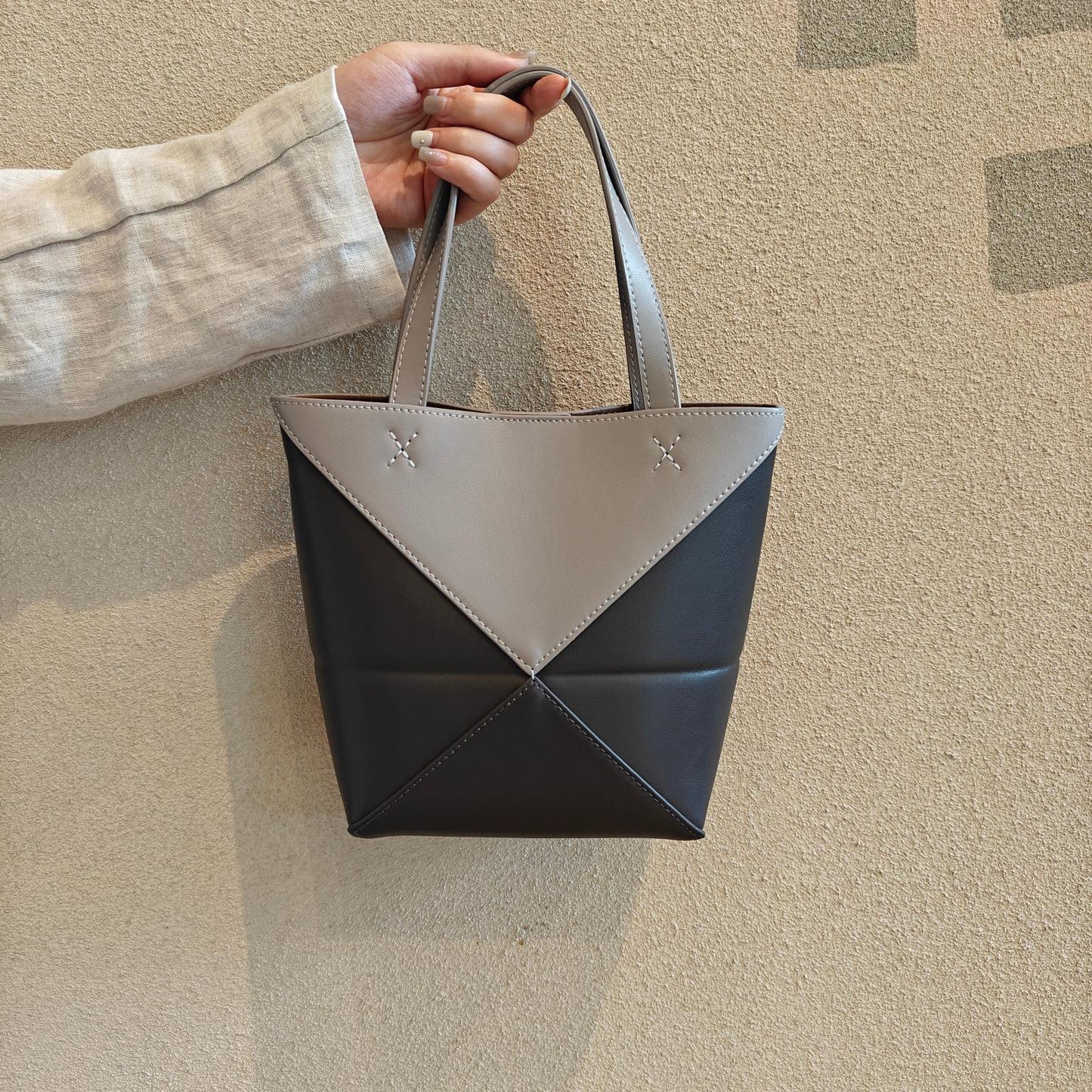 2024新款真皮女包变形几何拼接折叠托特单肩斜跨潮流双肩厂家