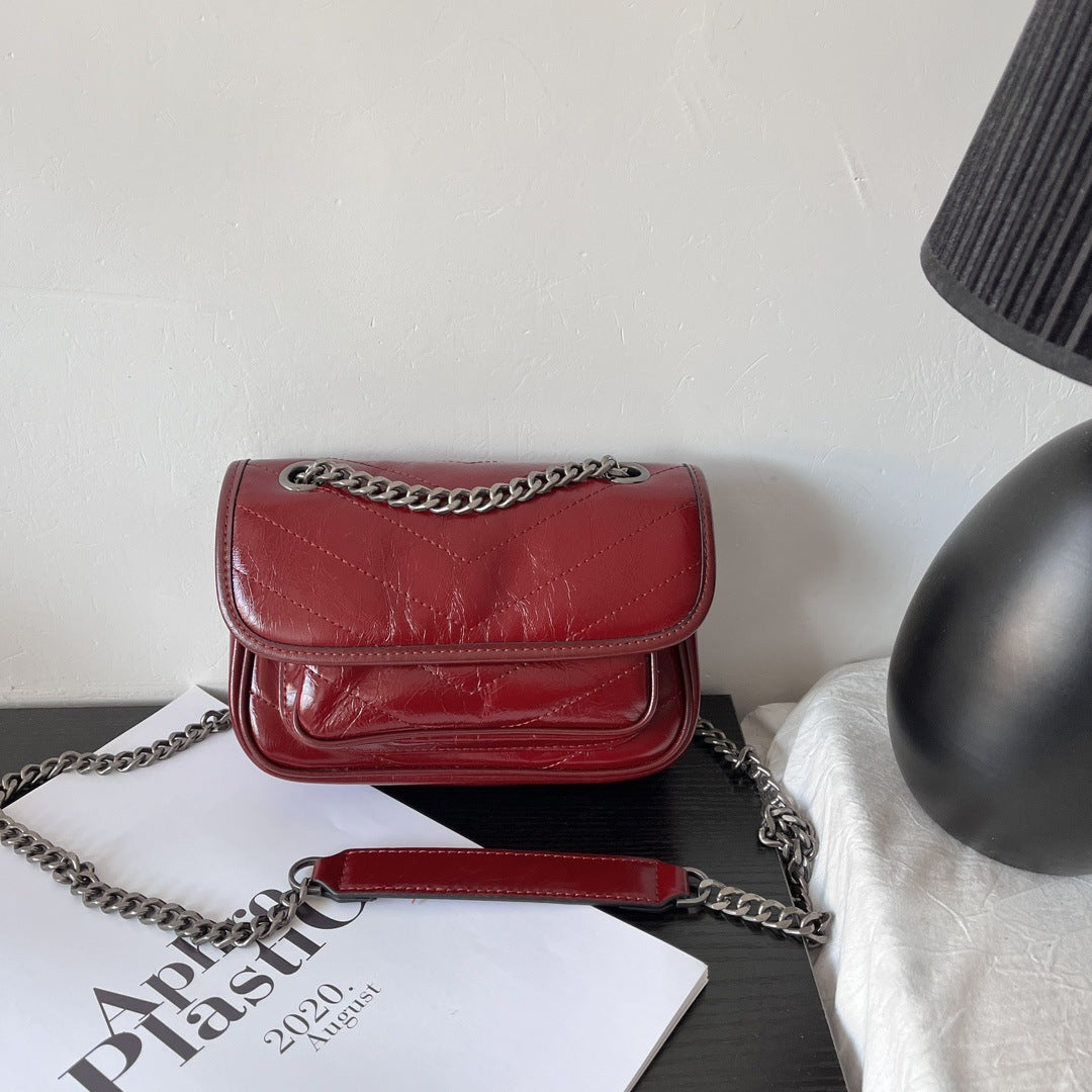 真皮腋下包女2023新款油蜡皮邮差包流浪包复古链条包斜挎一件代发