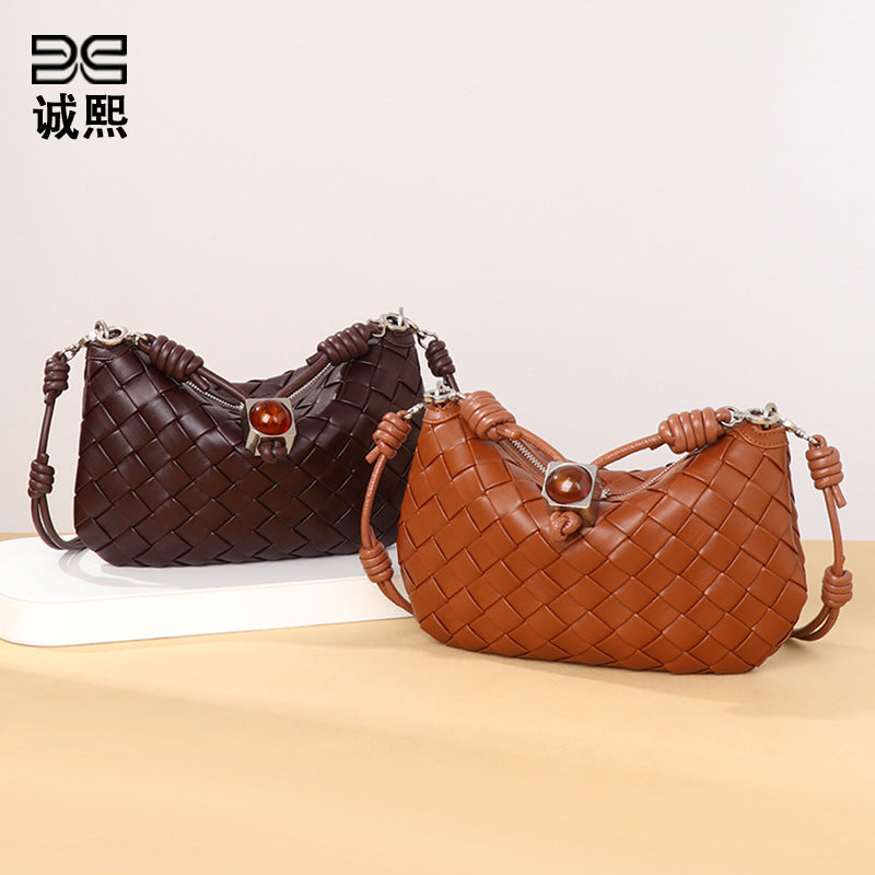 2025夏季新款手提手机包抽绳迷你小包包手工编织包女腋下包饺子包