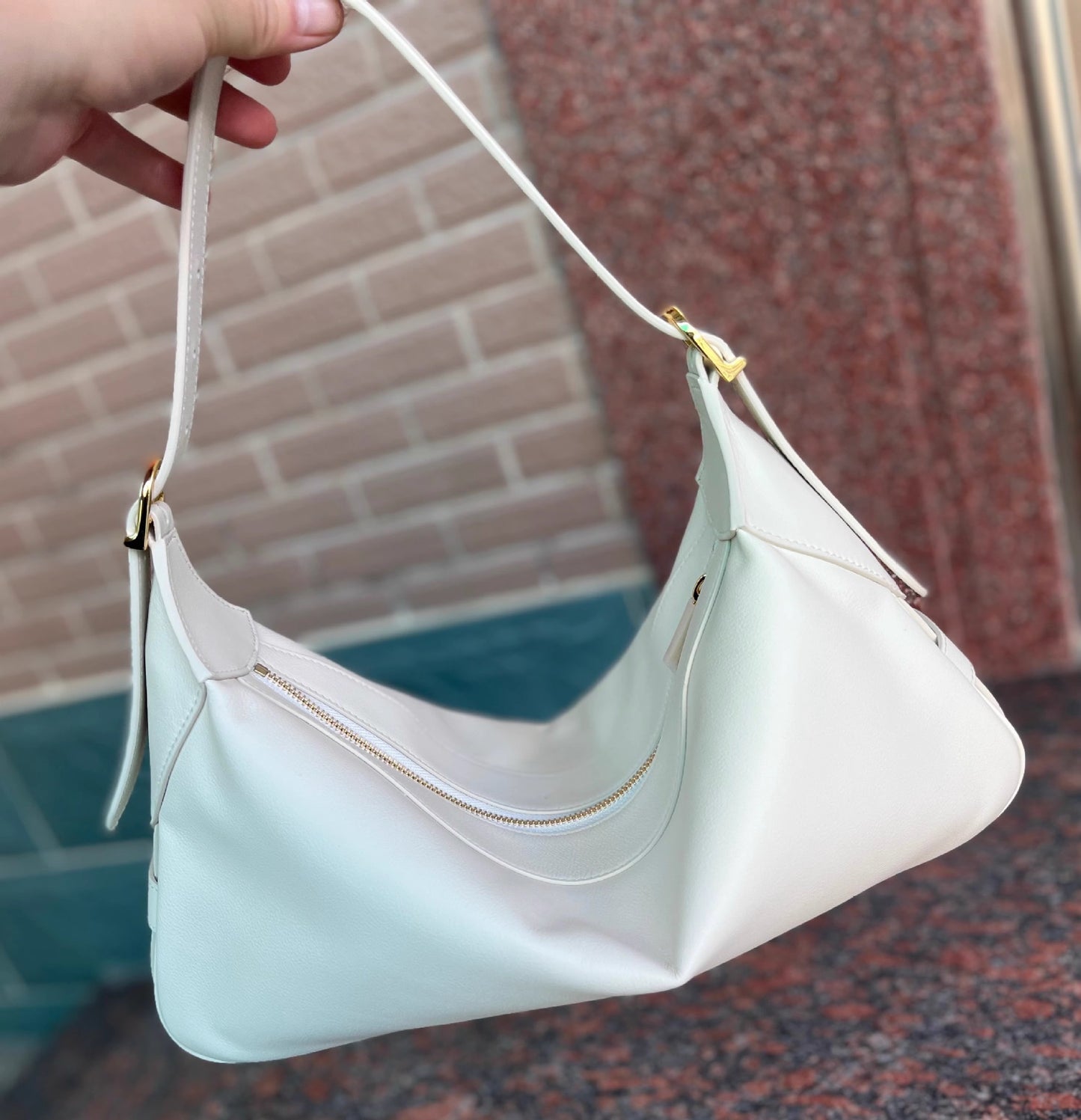 romy法式慵懒松弛感通勤包百搭真皮凯旋门女包大容量月牙饺子包女