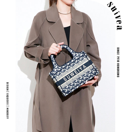 包包2025秋冬新款时尚欧美刺绣棉麻购物袋迷你手提包单肩斜挎女包