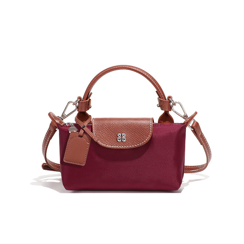 设计感女包百搭斜挎包小众迷你可爱饺子包时尚潮流拼色手提单肩包