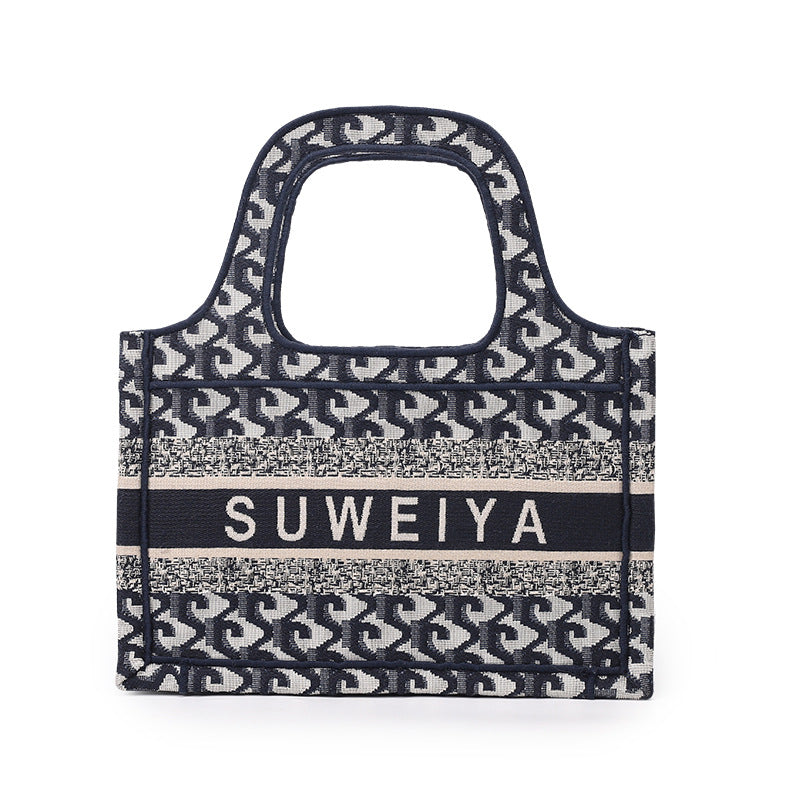 包包2025秋冬新款时尚欧美刺绣棉麻购物袋迷你手提包单肩斜挎女包