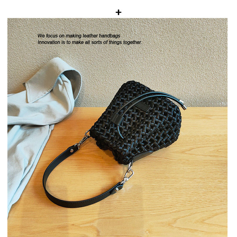 水桶包小包2024夏新法式小众高级感手工编织手提单肩斜挎包真皮女