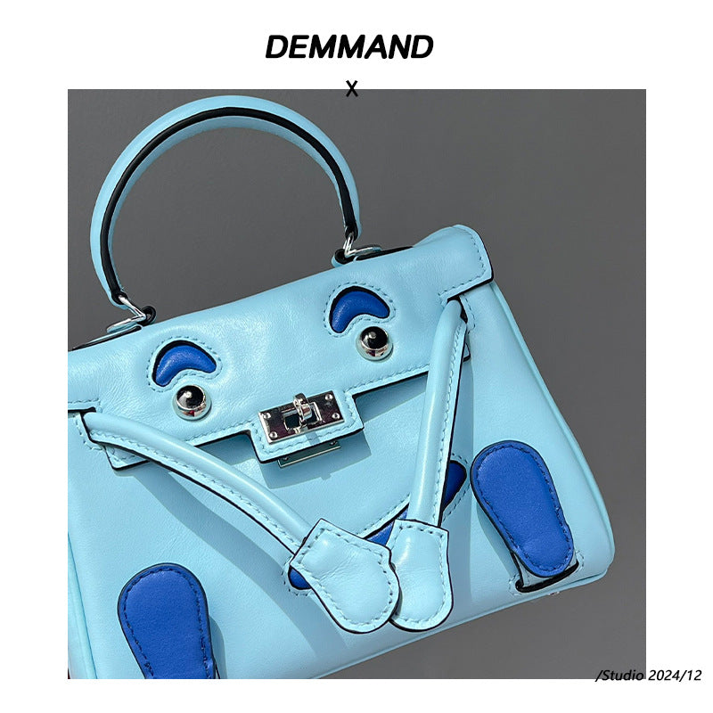 2025春季高级感头层牛皮笑脸包 千禧娃娃迷你凯莉包可爱斜挎包