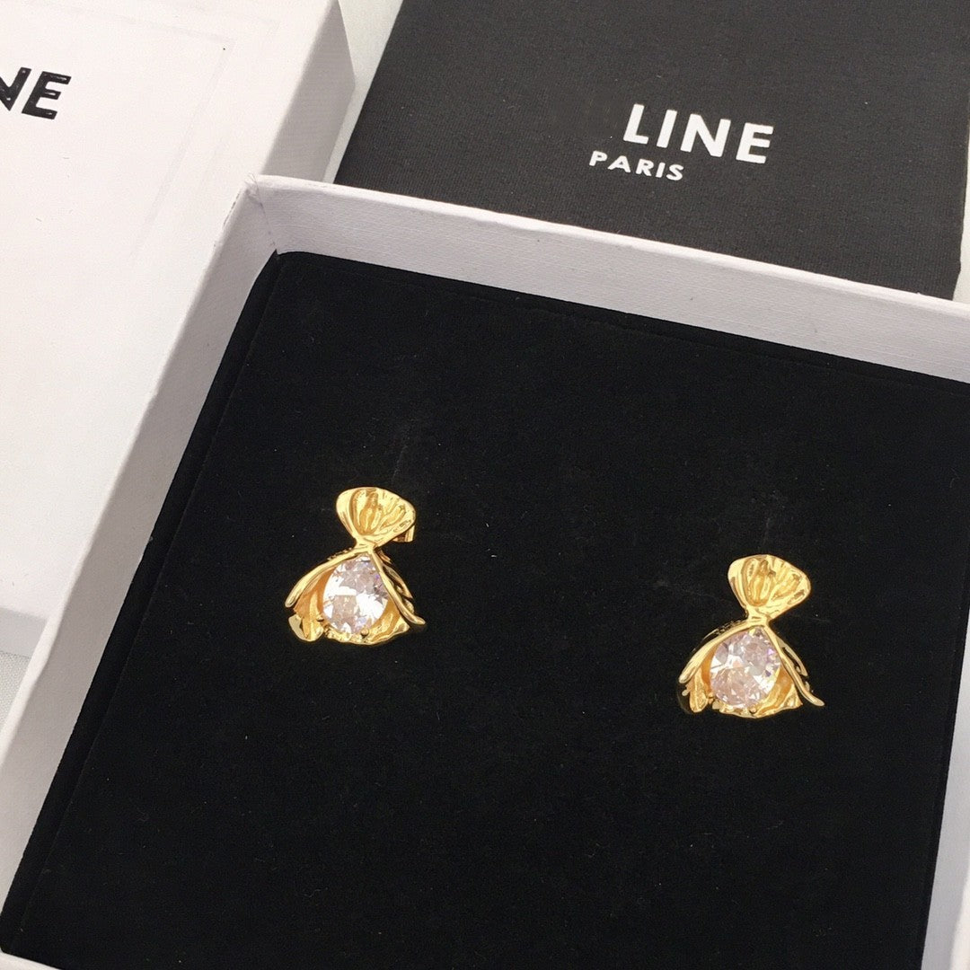 赛家新款手捧花耳钉女高级感个性气质锆石CEL风黄铜镀金耳环批发