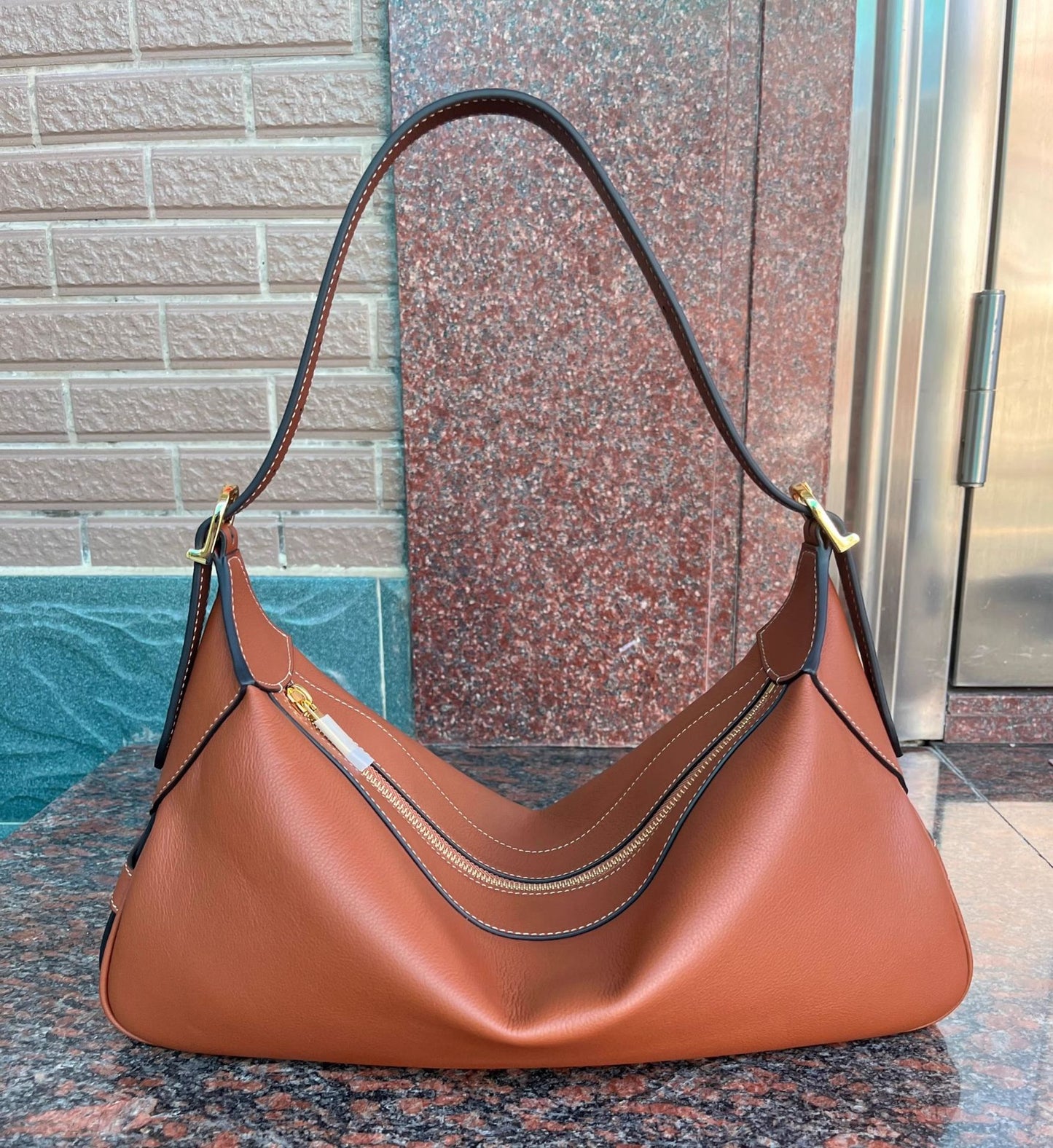 romy法式慵懒松弛感通勤包百搭真皮凯旋门女包大容量月牙饺子包女