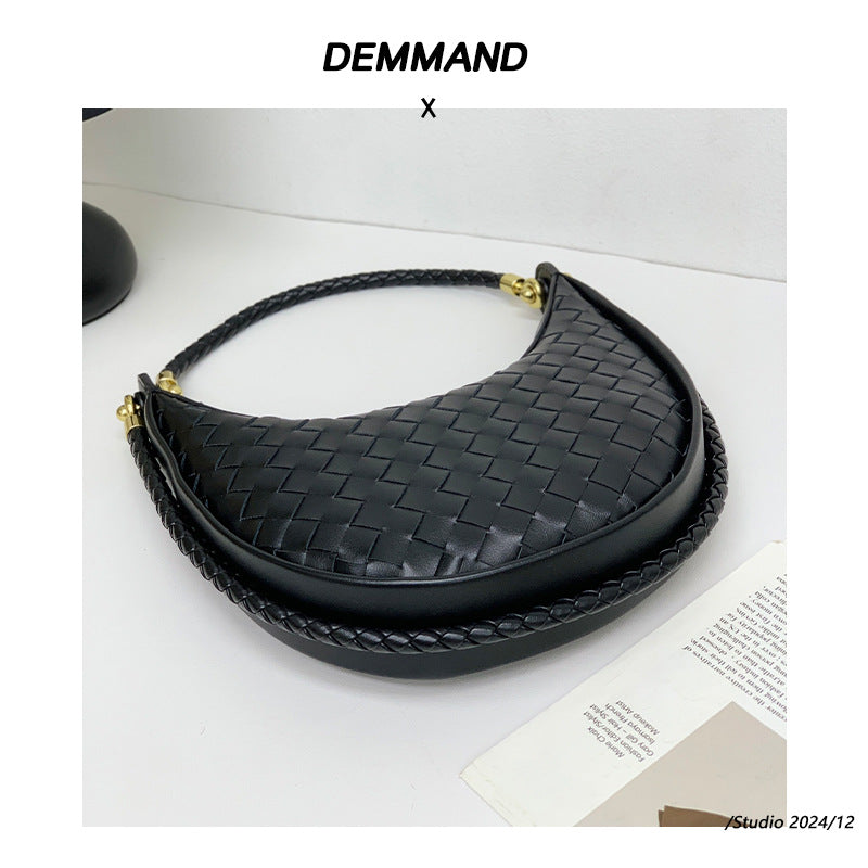 网红爆款编织纹真皮腋下包女百搭2025春季新款牛皮单肩斜跨饺子包